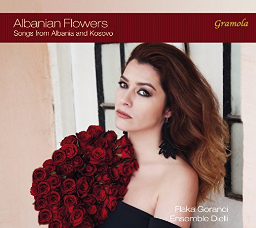 Woman in black dress holding red roses, with text on red banner and white text overlay.
