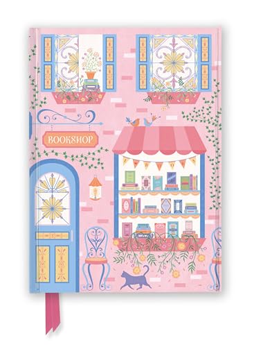Pink journal with illustrated bookshop facade, blue door, and black cat.