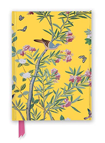 Yellow journal with floral and bird design, ribbon bookmark visible.