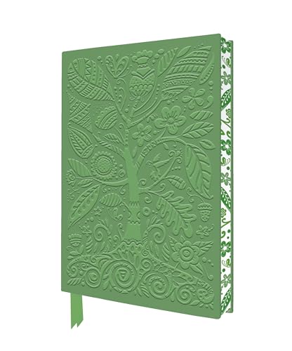 Green notebook with an embossed tree and floral pattern on the front cover.