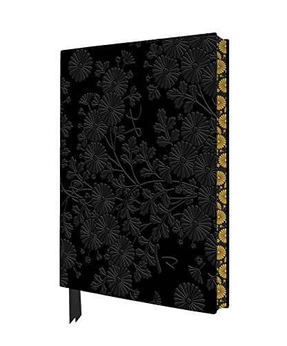 Black notebook with gold-edged pages and a repeating chrysanthemum pattern.