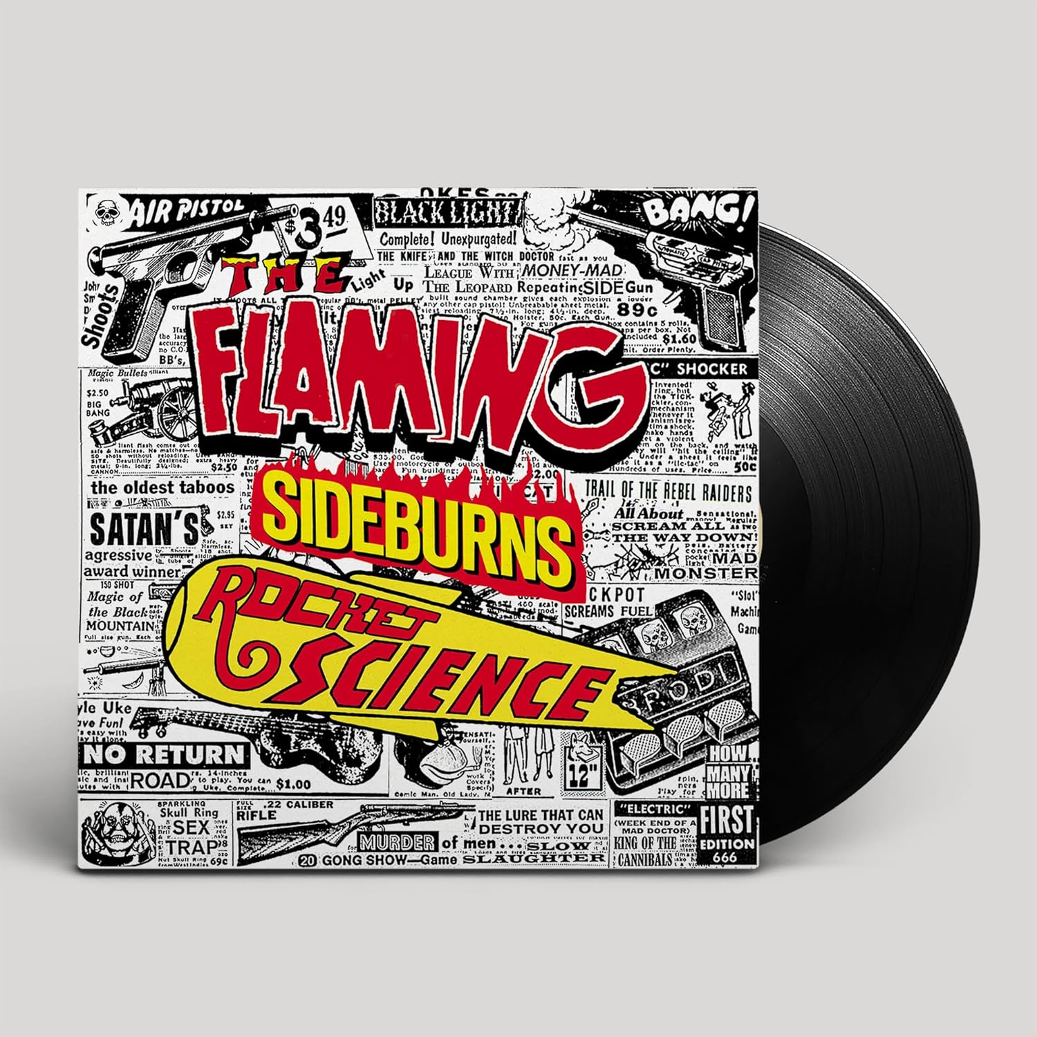 Vinyl record cover for "Flaming Sideburns - Rocket Science" with bold, comic-book style art.