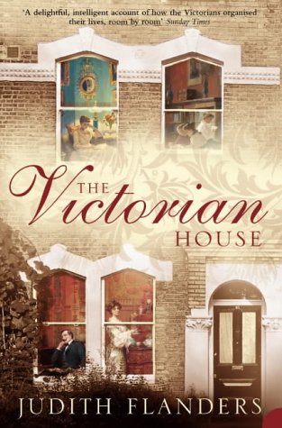 Book cover depicting a Victorian house with scenes in the windows.