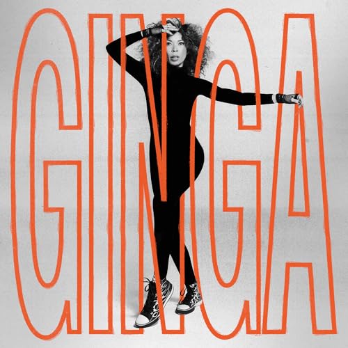 Black and white portrait of Flavia Coelho with orange “GINGA” text.