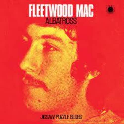 Fleetwood Mac “Albatross” vinyl cover: red background, close-up of a man’s face.