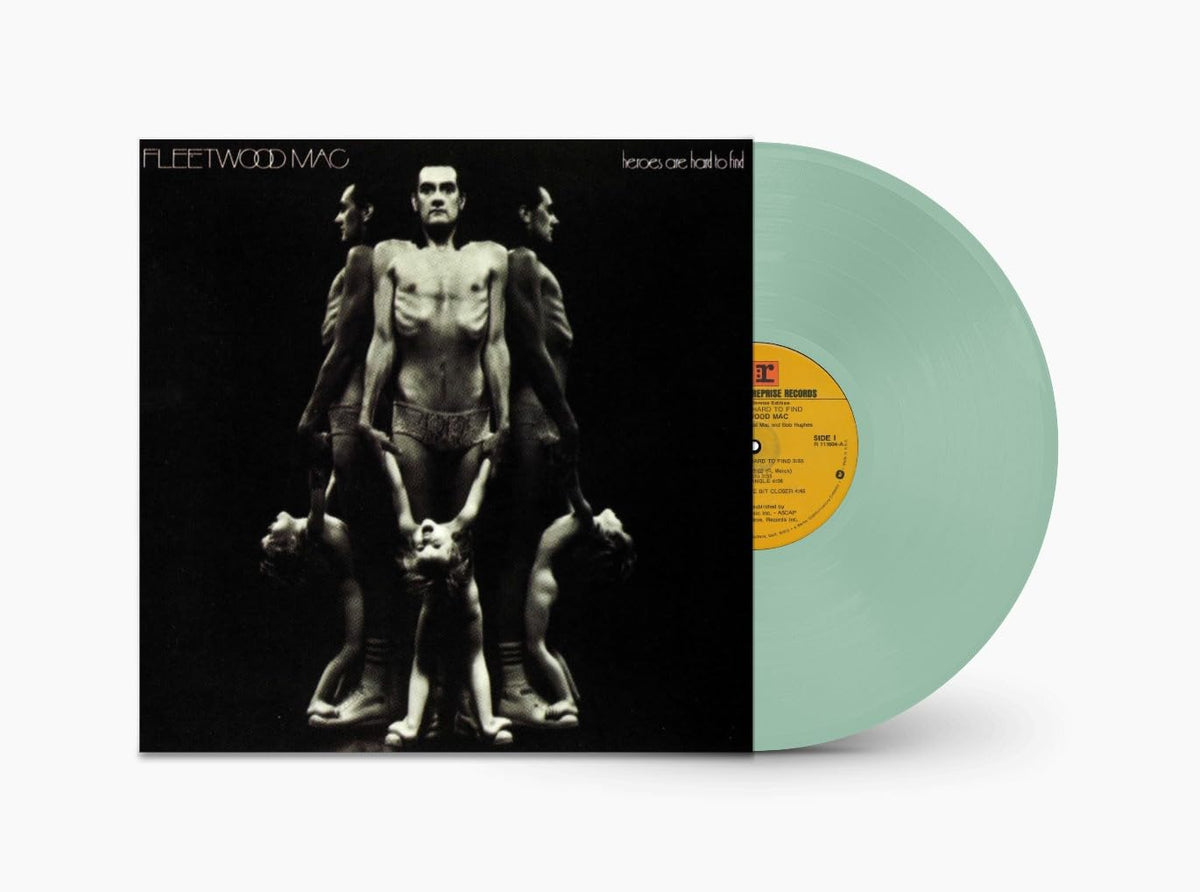 Fleetwood Mac "Heroes Are Hard to Find" vinyl record with green tint.