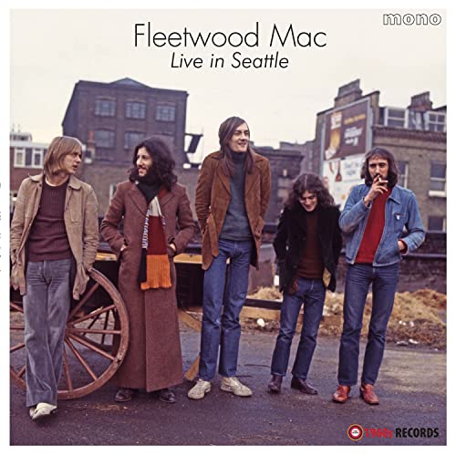 Fleetwood Mac band members posing on a city street, vintage album cover.