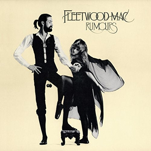 "Black and white album cover featuring a man and woman in a dramatic pose."