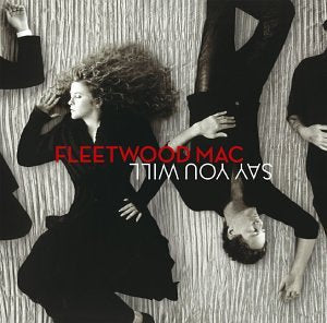Fleetwood Mac members lie on a textured background with the album title overlaid.