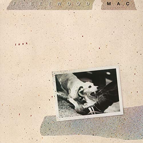 Fleetwood Mac’s “Tusk” CD cover with a photo of a dog and feet.