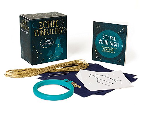 Zodiac embroidery kit with box, fabric, hoop, needle, and thread.