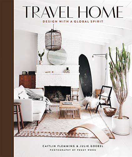 Book cover: bright living room with fireplace, plants, and neutral decor.