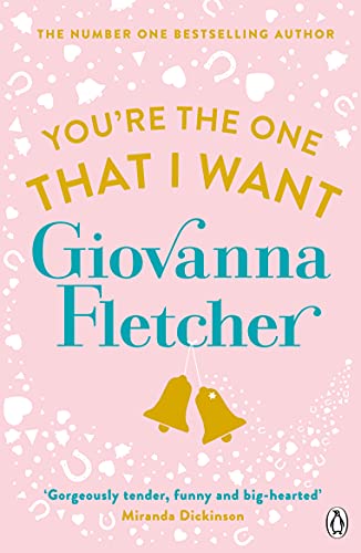 Book cover: "You're the One That I Want" by Giovanna Fletcher, pink background.