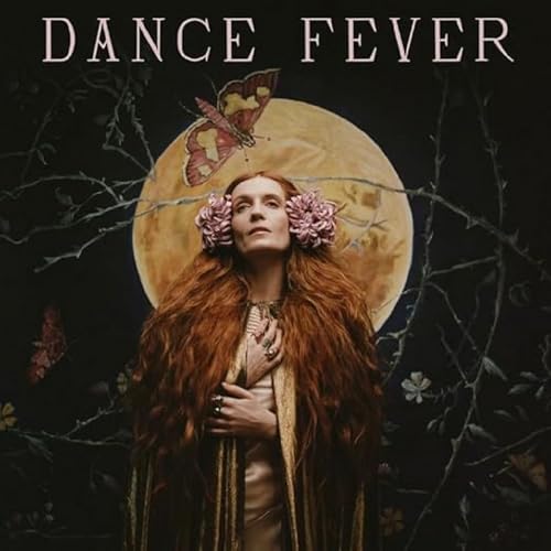 Florence Welch with flowers in her hair, against a moon and branches.