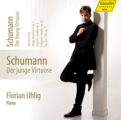 CD cover featuring pianist Florian Uhlig in a black coat, with text details.