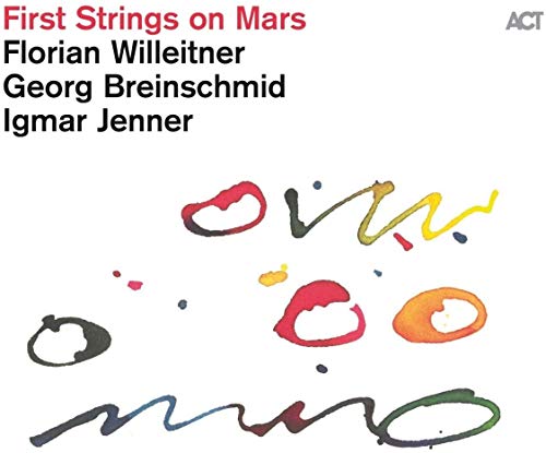 Album cover with text and abstract colorful ink-style shapes on a white background.