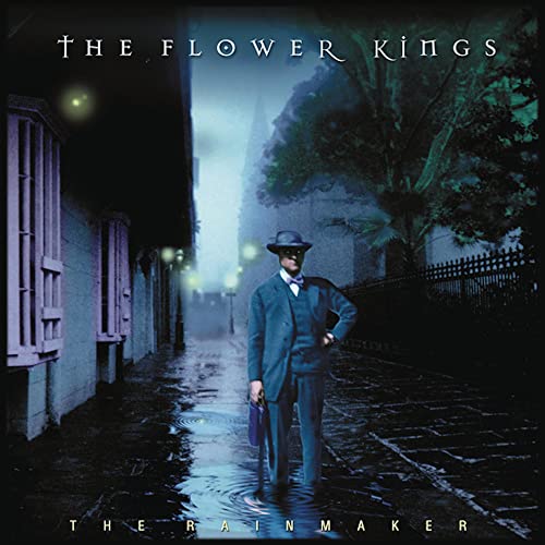 Album cover for The Flower Kings’ “The Rainmaker” featuring a man in a suit.
