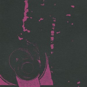Close-up of a vinyl record with pink abstract markings.