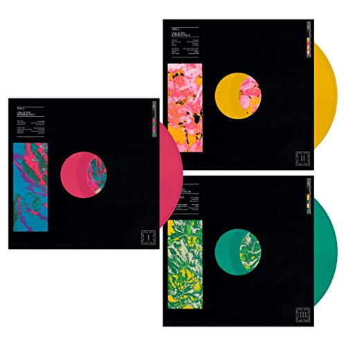 Four vinyl records with colorful abstract designs on black sleeves.