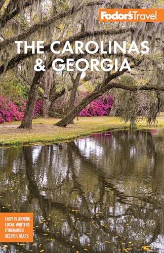 Fodor’s travel guide cover featuring trees reflected in water.