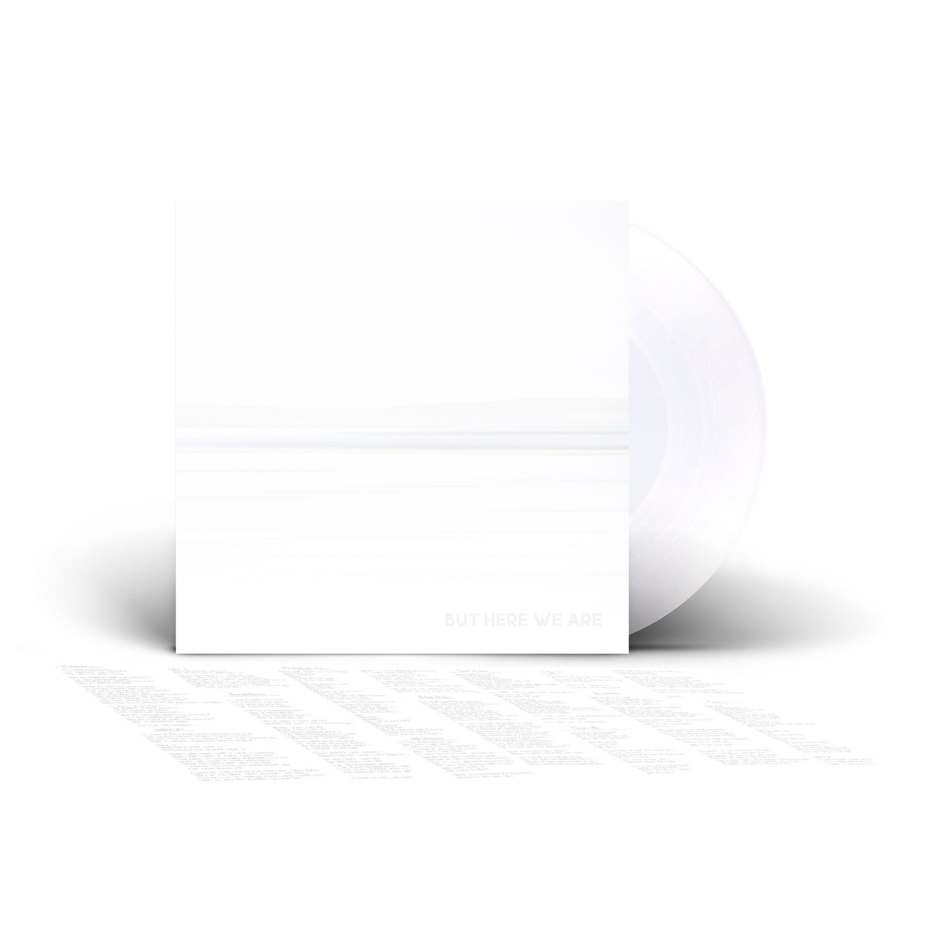 White vinyl record with a white album cover featuring a pale blue horizon.