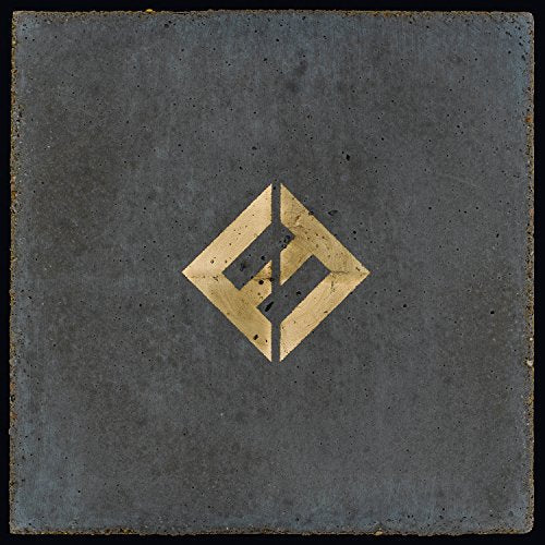A gold Foo Fighters logo centered on a textured, grey concrete square background.