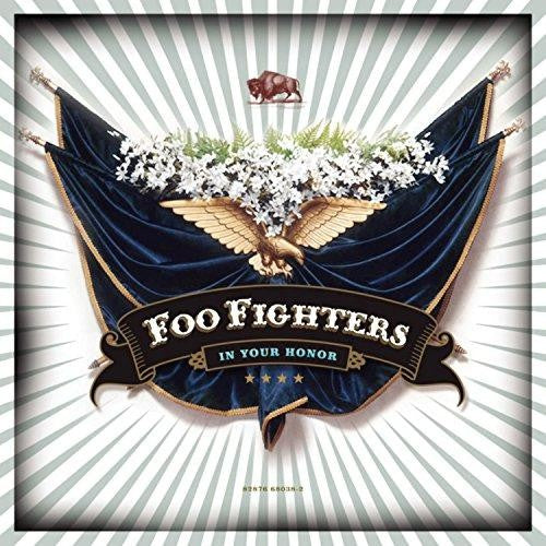 Foo Fighters "In Your Honor" album cover with eagle, draped flag, and stars.