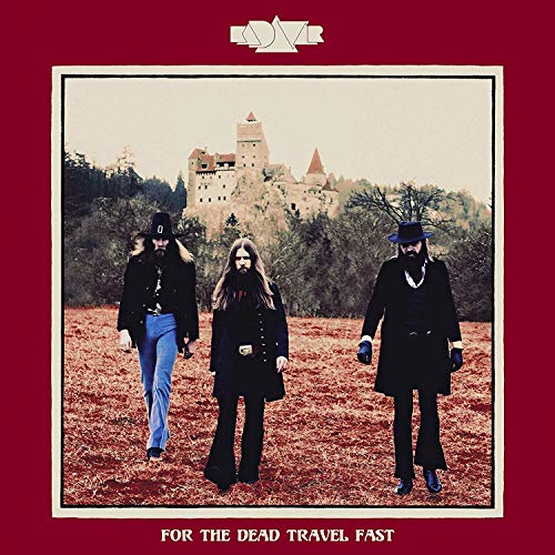 Blu-ray cover: three figures walk toward a castle in a landscape.