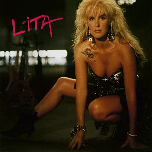 Lita Ford album cover: blonde woman with long hair in a sparkly dress.