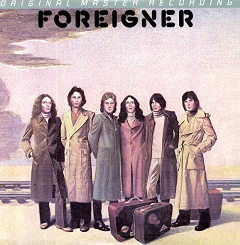 Foreigner album cover featuring a group portrait of five men.