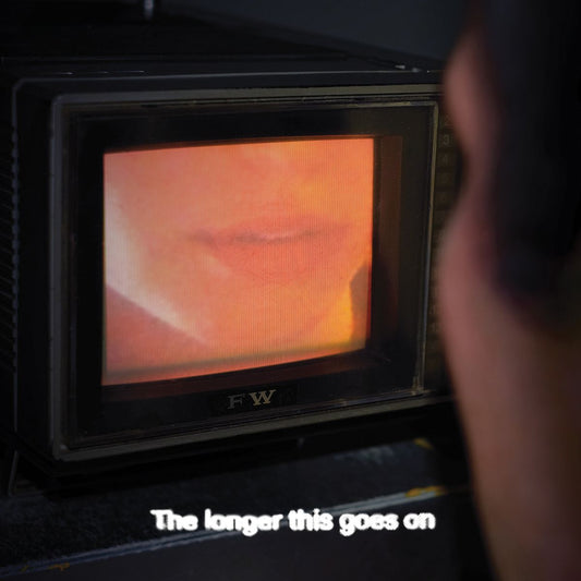 CD cover featuring a blurred face viewed through a microwave screen.