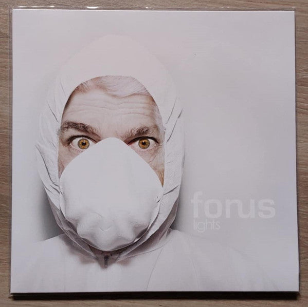 Vinyl album cover: a face wrapped in white fabric, text "forus lights".