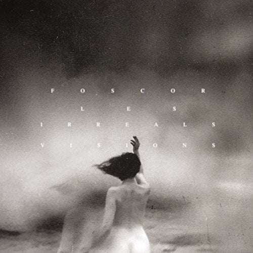 Black and white vinyl album cover featuring a woman in a white dress.