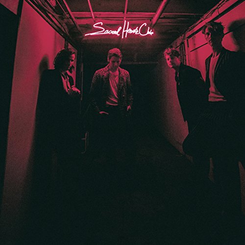 Foster The People album cover: band in a red-lit hallway.