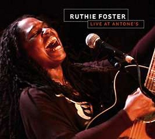 Ruthie Foster sings and plays guitar on a live album cover.