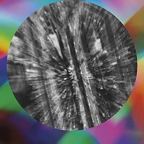 Black and white abstract circular design with blurred, radiating lines.