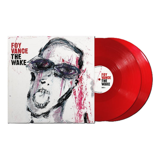 Red vinyl record and album cover with painted portrait.