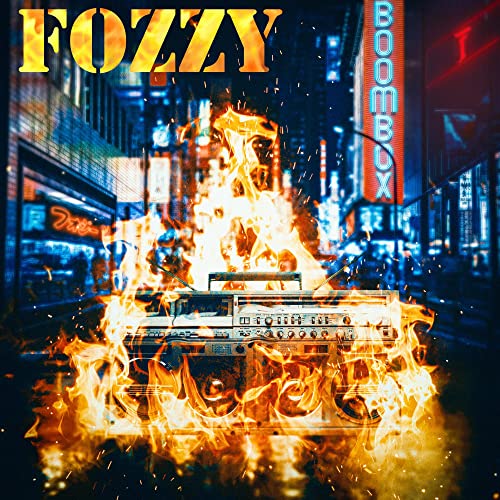 Fozzy “Boombox” CD cover: a flaming boombox in a city scene.