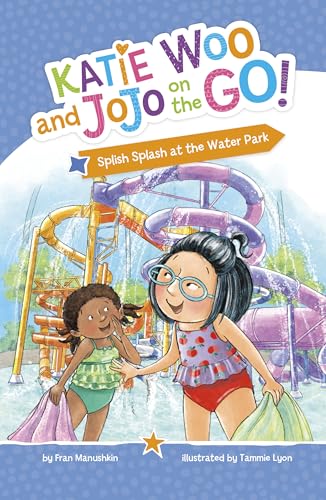 Two girls at a colorful water park with a large water slide.