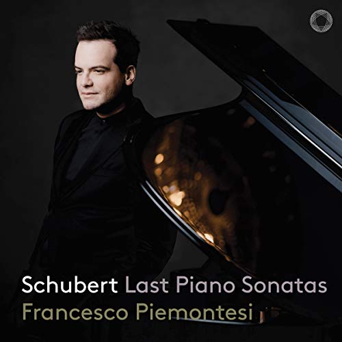 Pianist Francesco Piemontesi beside a grand piano, album cover for Schubert sonatas.