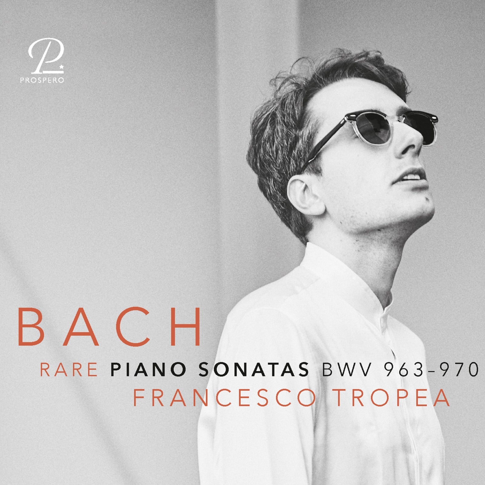 CD cover featuring a man wearing sunglasses and the word "BACH".
