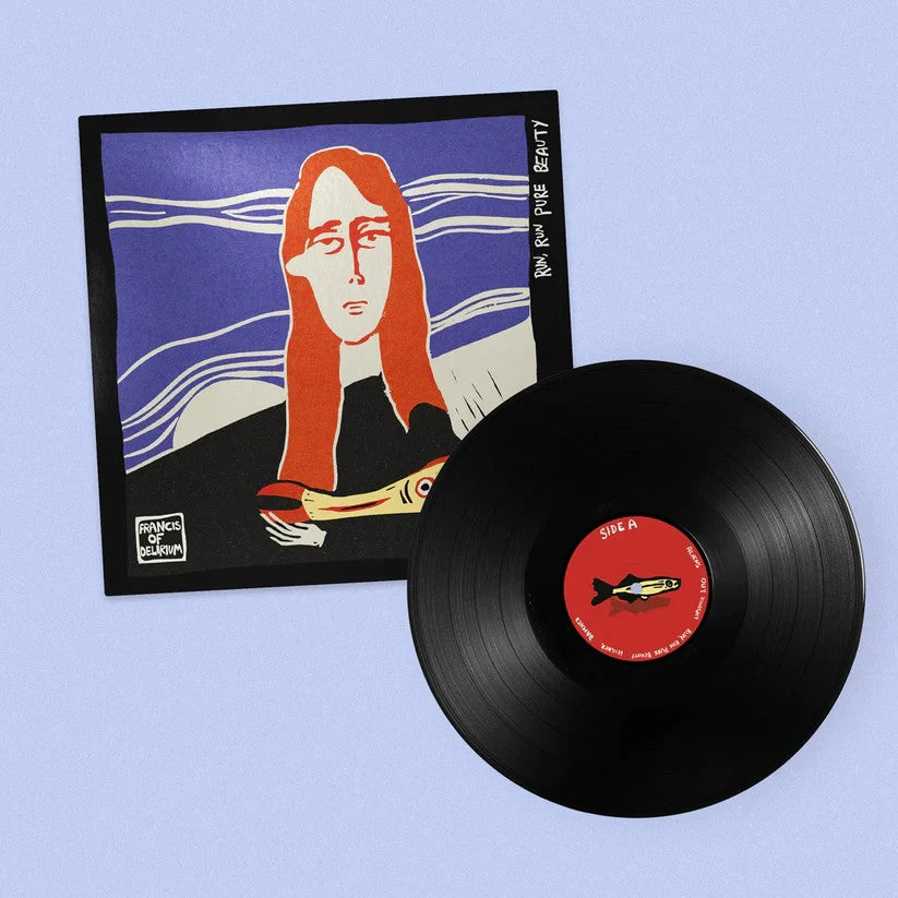 Vinyl record with illustrated cover featuring a red-haired figure.