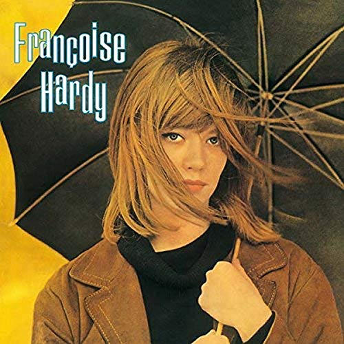 Francoise Hardy portrait under an umbrella, album cover with yellow and black.