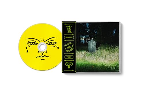 CD case with yellow face design and a graveyard scene.
