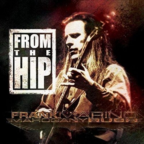 Frank Marino playing guitar on the album cover for From The Hip by Mahogany Rush.
