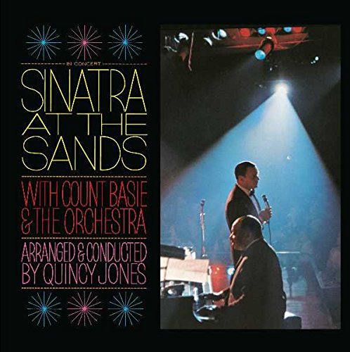 Frank Sinatra album cover, stage lighting, and musicians performing.