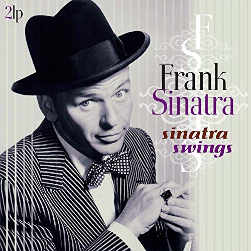 Frank Sinatra in a hat and striped suit on album cover.