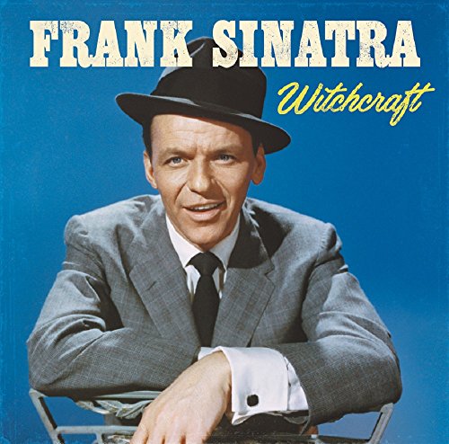 Frank Sinatra in a hat and suit on a blue album cover.