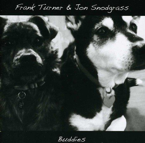 "Black and white album cover with two dogs and artist names."