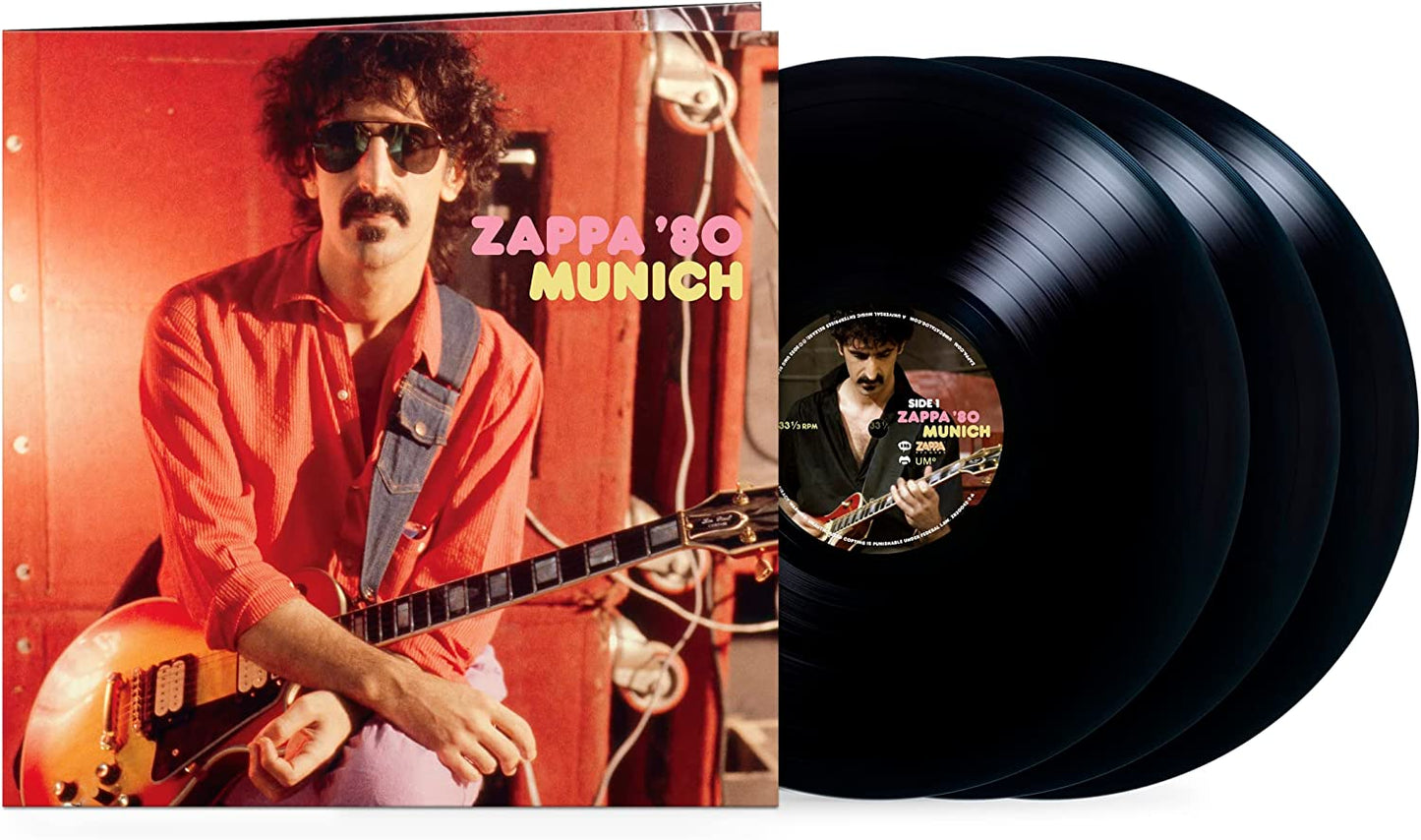 "Frank Zappa vinyl record album cover with three black vinyl records."